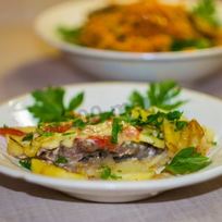 Рецепт Мяса свинины по-французски с помидорами картошкой сыром