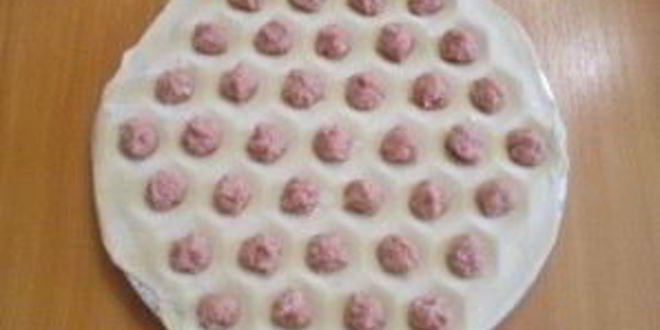 Рецепт пельменей под соусом