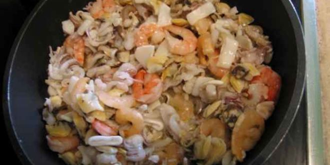 Рецепт ризотто черного с дарами моря