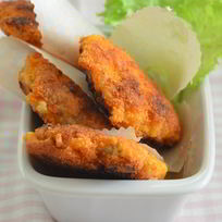 Рецепт Хрустящих мини-шницелей из свинины в панировке с тертым сыром