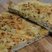 Рецепт Фокаччи с сыром и ветчиной из индейки