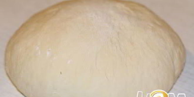 Рецепт печеных пирожков с жареной капустой и яйцом