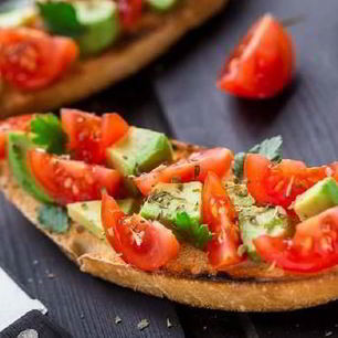 Рецепт Итальянской брускетты с помидорами и авокадо