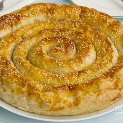 Рецепт Слоеного рулета с творожно-сырной начинкой