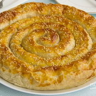 Рецепт Слоеного рулета с творожно-сырной начинкой