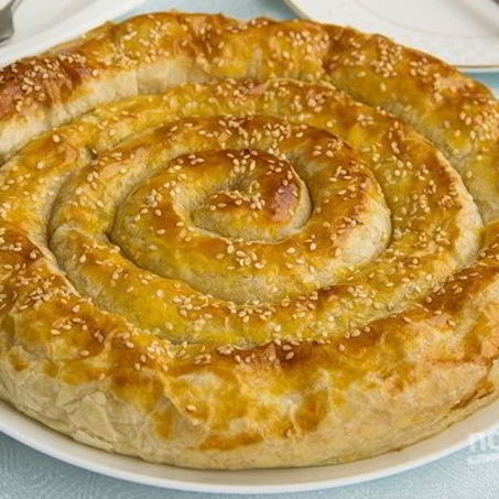 Рецепт Слоеного рулета с творожно-сырной начинкой