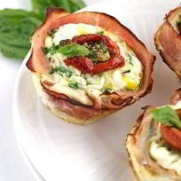 Рецепт Тарталеток с луком, ветчиной и сырным соусом